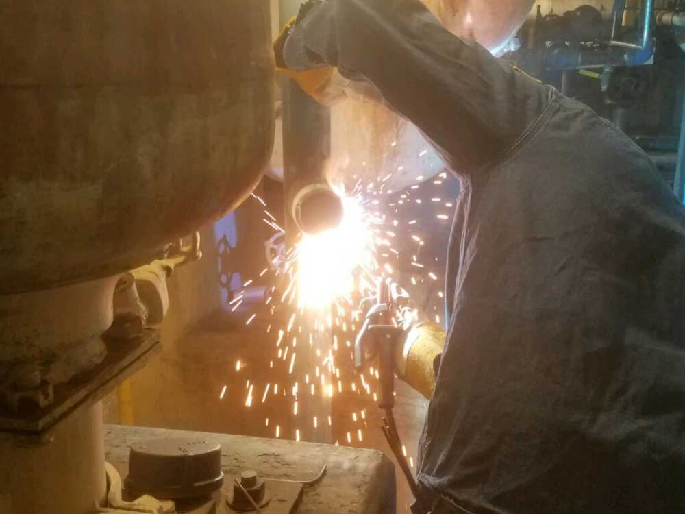 Welding 3" Linestop Fittings for Los Angeles County Sanitation on Steel in Carson
