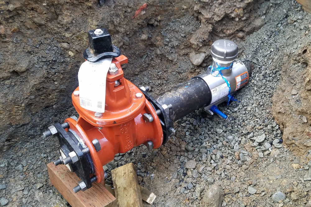 10inch Linestop on DIP-CI-PVC Water Main below ground under 100 psi Washington with Completion Plug